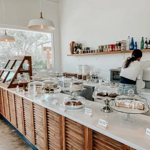 a woman preparing food in a kitchen
