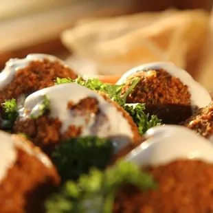 Mouth watering, crunchy, freshly made and deliciously spiced FALAFELS... their all time best seller !