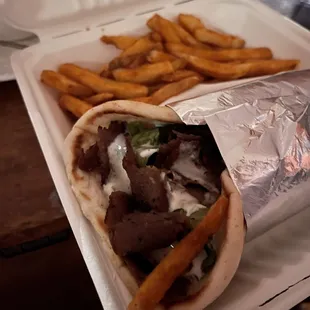 Lamb gyro with a side of fries