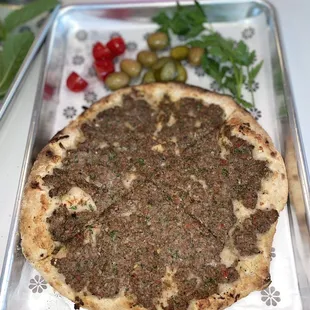 Lahme B Ajeen - Again, the Dough is perfection. The seasoning of the meat was amazing! I can eat this everyday. 10/10