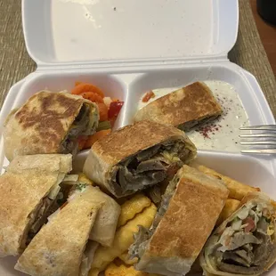 Lamb gyro plate with French fries, tzatziki sauce, and mixed veggies (carrots, cauliflower, celery)