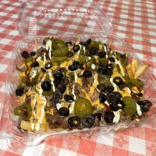 The loaded nacho fries with tri-tip is 10/10 extremely fire with so much flavor