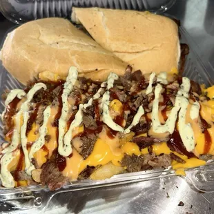 Tri-tips sandwich with tri-tip loaded nacho fries