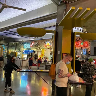 a group of people in a restaurant