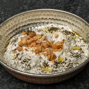 a bowl of yogurt and nuts