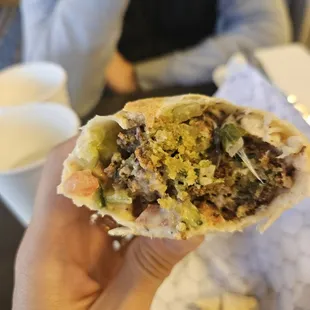 the remainder of what was a falafel wrap . 11.80