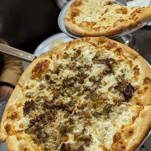 Cheese steak pizza and cheese pizza