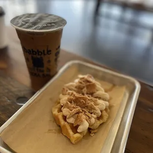 a plate of food and a cup of coffee