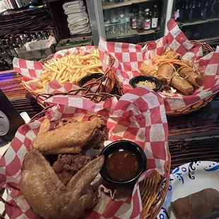 Spring rolls, fries and fried chicken. Huge wings!!!