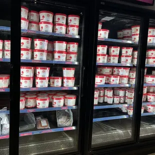 Various large ice cream tubs