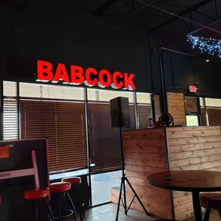 a bar with a neon sign