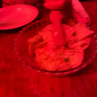 Salad time under red neon