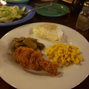 Fried chicken sides mashed potatoes, corn ,green beans