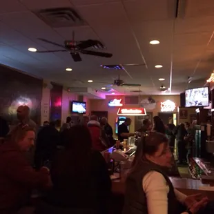 people sitting at the bar