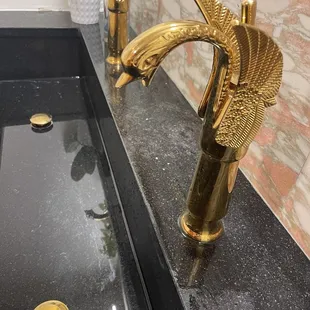 Beautiful swan sink in the ladies' bathroom