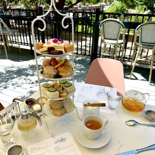 Afternoon tea spread on the patio facing the creek