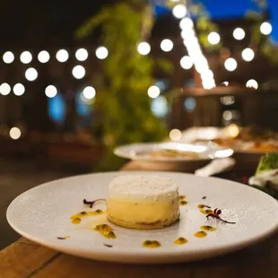 Passionfruit mousse with panna cotta layer topped with shredded coconut!