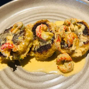 Appetizer: Crab Cakes topped with a crawfish lemon butter sauce. Absolute Deliciousness!