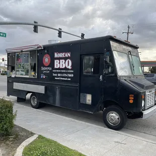 a bbq truck parked on the side of the road