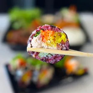 Tuna Kimbap: Korean Seaweed Rice Roll w/ tuna, mayo, carrots, pickled radish, cucumbers, lettuce  | 8 pc - $15