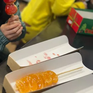 Tanghulu strawberry, tangerines, grapes - syrup coating was crunchy, but way too thick / much. And fruit wasn't tasty as I expected!