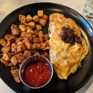 Wild mushroom &amp; truffle omlette with home fries