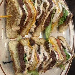 Balkan Club with homemade spicy ranch drizzled on top.