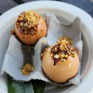 Balut with Fried Garlic &amp; Salty Sweet Sauce.  Delicious!