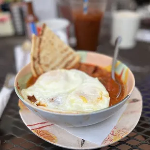 Moroccan Stew with over medium eggs.