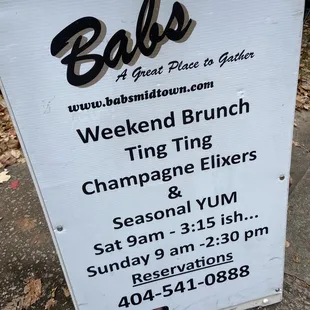 a sign for the weekend brunch