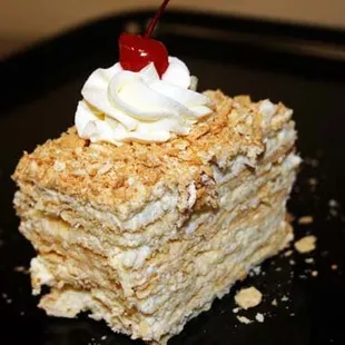 Napolian unsweetened layered cake with soft sweet cream.