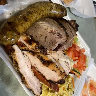 Shak's Platter, 5 types of meat and 2 sides. Sausage, boudin, Chicken Breast, ribs, and brisket  So worth it!