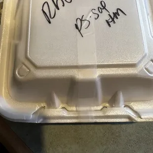 Loving the tape to keep the sauce and meat to go from making a mess