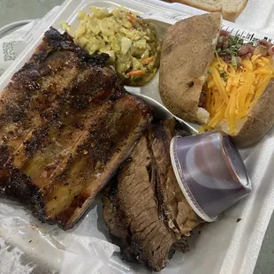 Meat combo: ribs, brisket, loaded baked potato and coleslaw