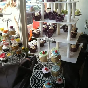 a variety of cupcakes on display