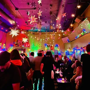 a crowd of people at a party