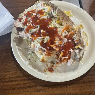 BBQ Baked Potato with chicken, white sauce and medium heat sauce