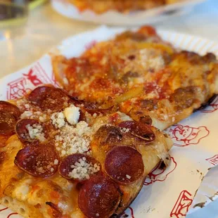 Pepperoni in front, background is sausage and peppers.  Both were good, pepperoni was fantastic!