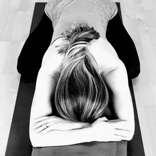 Child's pose supported with a bolster for pregnancy