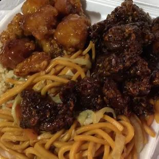 The dark chicken is the house chicken, the other is the orange chicken both worth a try!