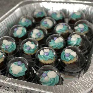 a tray of cupcakes