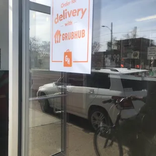 a delivery truck and a bicycle