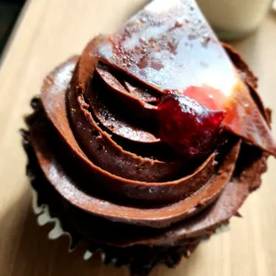 Chocolate cake, Raspberry center, with chocolate fudge frosting.