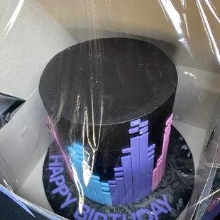 a cake in a plastic box