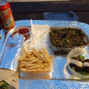 Shawarma Sandwich and fries. Tabolah and falafel!! Oh yeah and my drink Sparkling Vimto Fruit Flavored Drink!