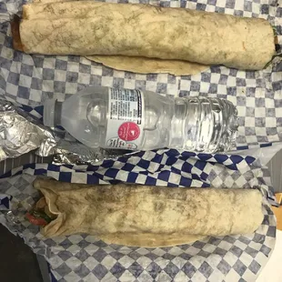 Jumbo shwarma on top and regular on bottom. Water bottle in the center for size.