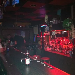 a bar with red lights