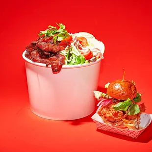 baby&apos;s buns and a bucket of food