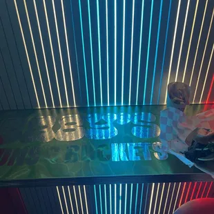 Small bar table in the back for enjoying the food