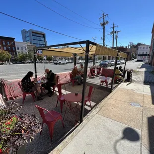 a group of people sitting at a table
